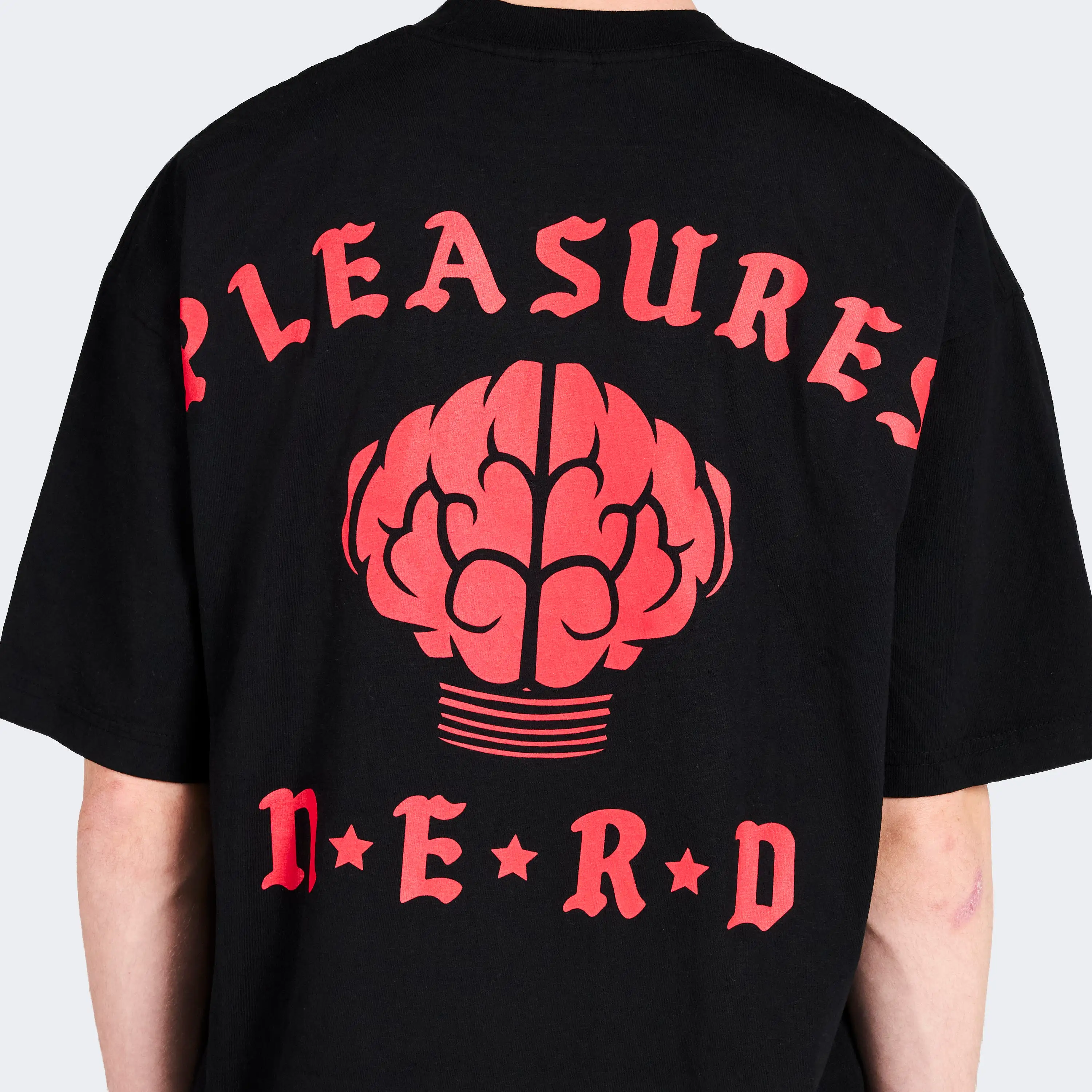 N.E.R.D. X Pleasures Rockstar SS Tee